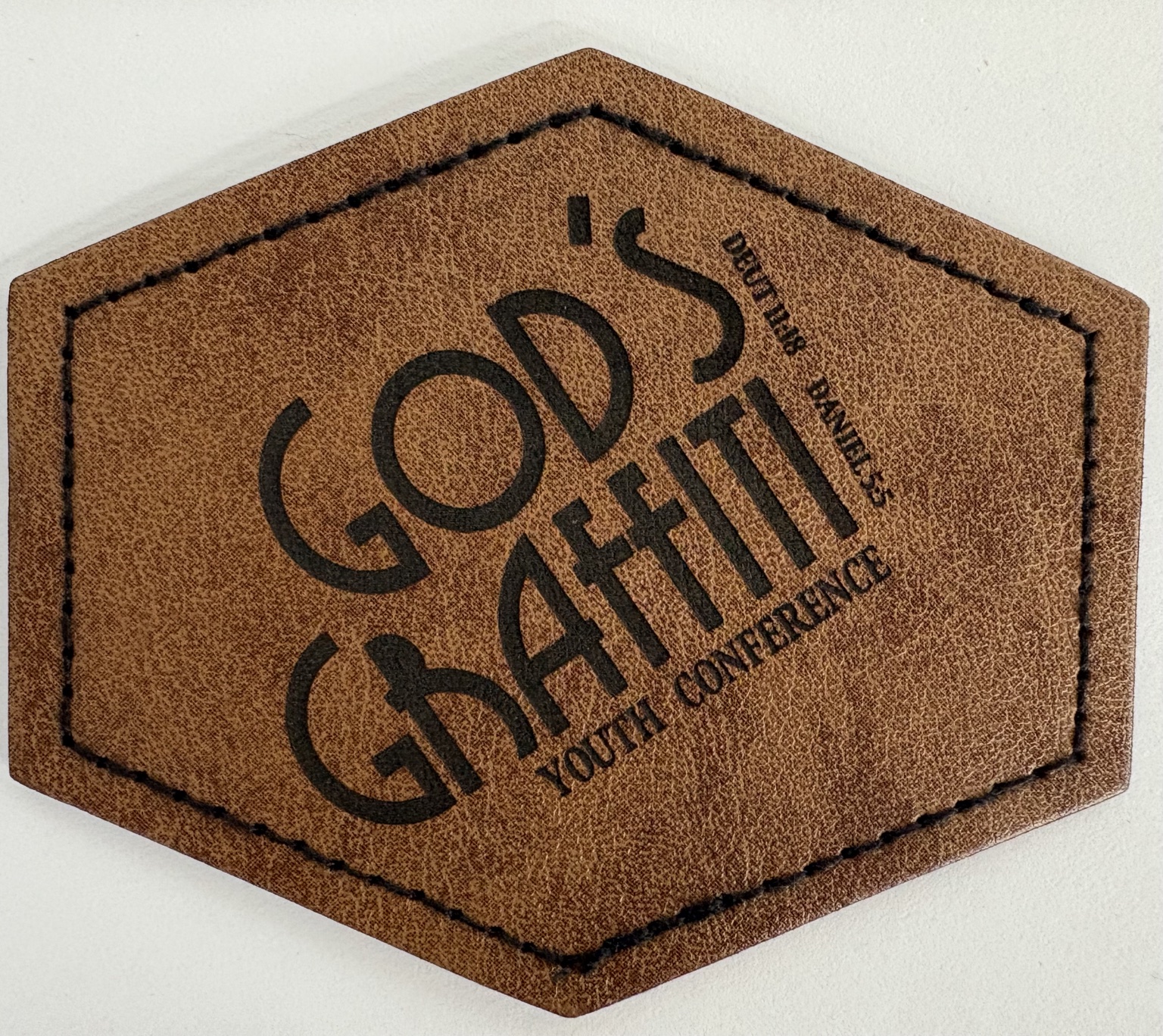 Custom leather patch engraved by S&B Design & Graphics