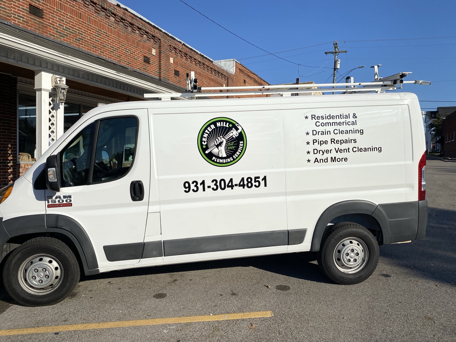 Commercial vehicle graphics designed for a local plumbing business